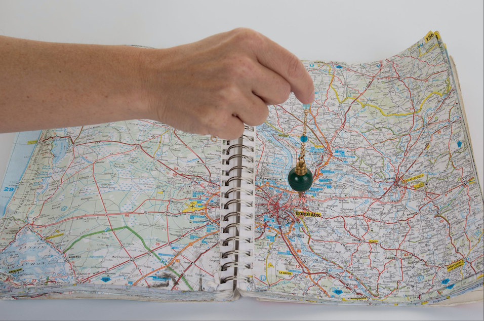 Using a pendulum and map to dowse Using a pendulum and map to dowse