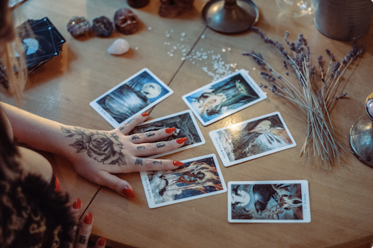 Getting a tarot reading at a fair like Mind-Body-Spirit